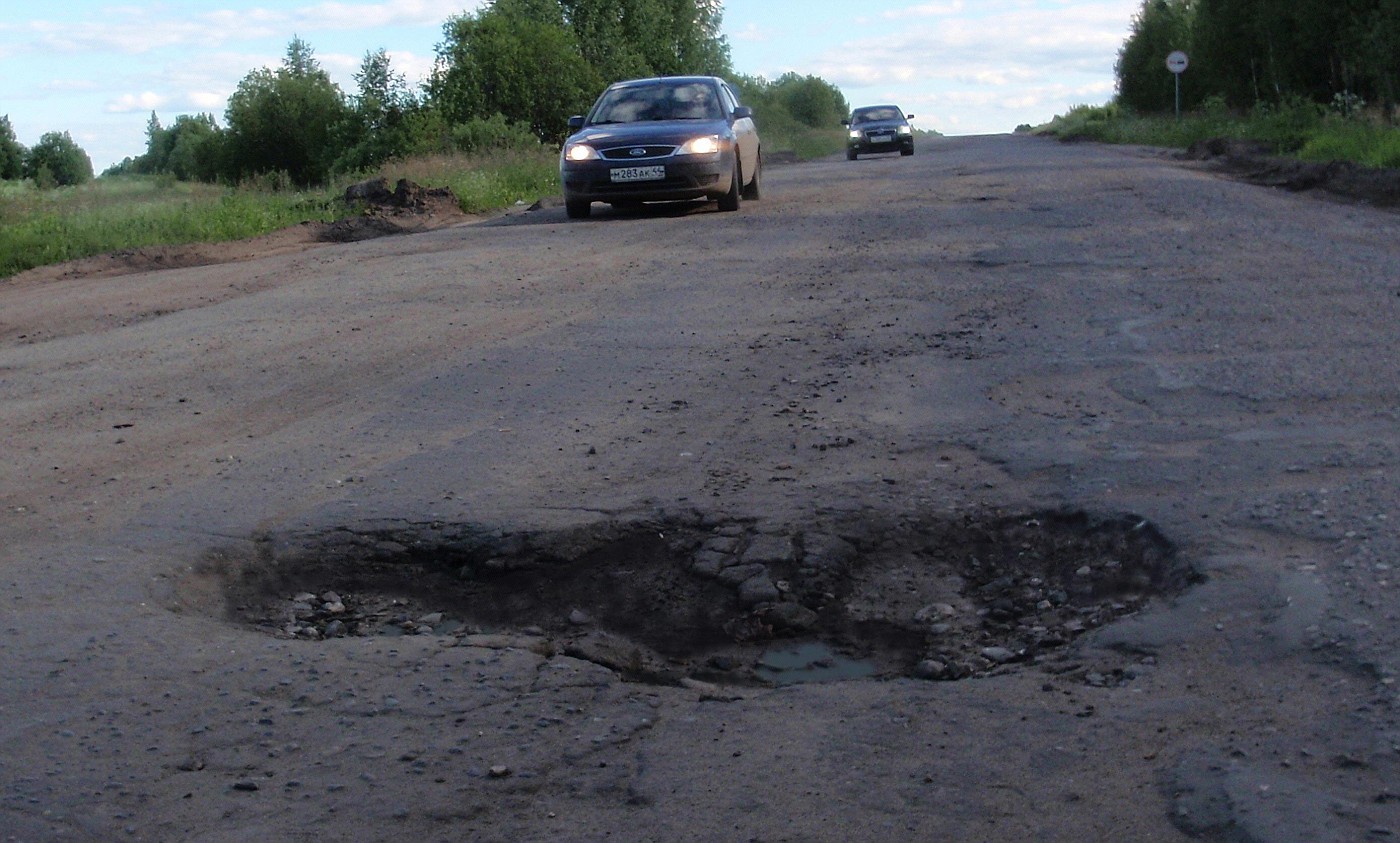 Typical pot-hole in Russian country road