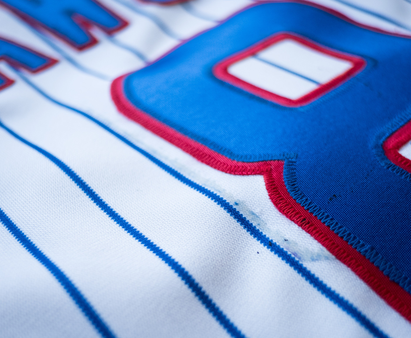 Can anyone show me the difference between stitched adidas jersey