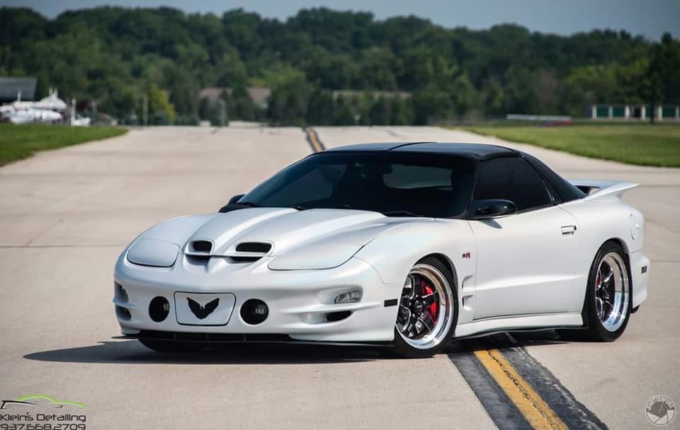I think the white Firebird is a Trans Am WS6 Ram Air, not a Firehawk