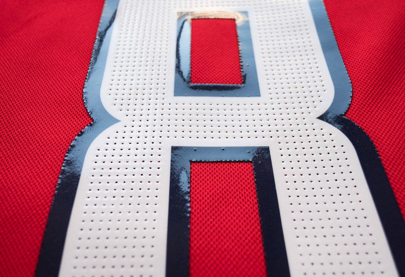 Can anyone show me the difference between stitched adidas jersey numbers and heat pressed? r